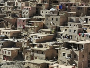 Densely built settlement with traditional houses on a mountainside, Morocco