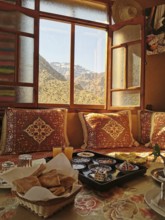 Traditional room with mountain views and breakfast in the warm light of the morning, Atlas