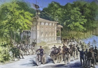 A velocipede race in Pre Catalan, Paris, France, velocipede is a human-powered land vehicle with