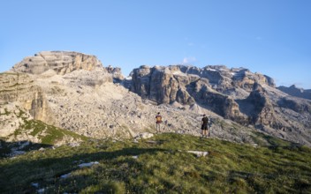 Hikers on the Grosté Plateau, mountain peaks of the Brenta Mountains, Brenta, Brenta-Adamello