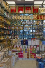 A lively gift shop full of colorful plates and traditional Turkish decorations, Konya, Central