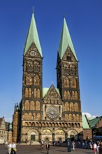 Gothic cathedral with two towers and clock under a clear sky, The Cathedral of Bremen