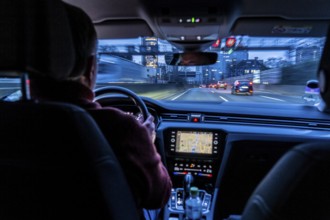 Driving on the A40 motorway, Ruhrschnellweg, in heavy traffic, drivers' perspective, Essen, North