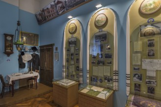 Dining area from a Jewish apartment, showcases with historical photos, Jewish Museum, Czernowicz,