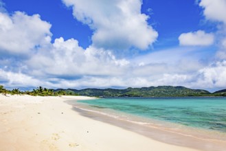 White clouds Cumulus clouds over Caribbean uninhabited Caribbean island from Lesser Antilles in