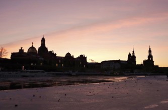 Dresden on a winter evening, Elbe, Church of Our Lady, Palace and Court Church, Saxony, Germany