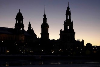 Dresden on a winter evening, castle and court church, Saxony, Germany