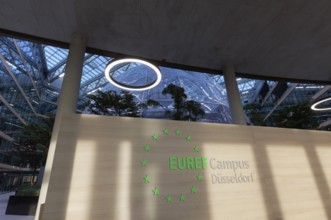 EUREF-Campus Düsseldorf, atrium with logo, European Energy Forum for Climate Protection and