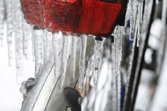 Bicycle icy due to freezing rain, icicles, detailed view