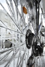 Bicycle icy due to freezing rain, icicles, detailed view