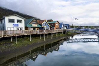 Colourful houses on the harbor, with reflection, Seward, Kenai Peninsula, Alaska, USA