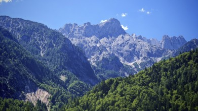 Rocks and mountains under a blue sky, Slovenia