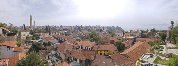 Panoramic view of a city Antalya cityscape with red roofs and historic buildings, Antalya, Turkey