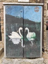 A painting of two swans (cygnus) in the water, natural scenery, Skopje, North Macedonia