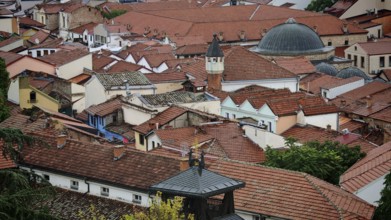 View of an old town with red tiled roofs and a dome, Skopje, North Macedonia