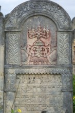 Coloured relief of a five-armed candleholder on a tombstone, Jewish cemetery, since 1866,
