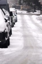 Cars parked in winter in snow, Germany