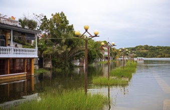 Flooded shore on Lake Petén Itzá in Flores, Petén Department, Guatemala