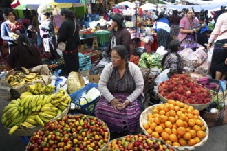 Mayan woman wearing traditional clothes at the market in Sololá, Highlands, Sololá Department,