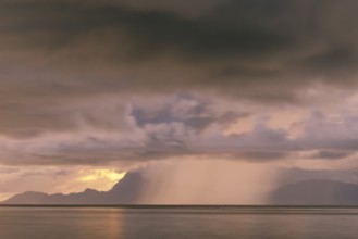 Tropical rain shower off Tahiti, Franz. polynesia