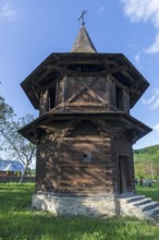 Wooden bell tower near the Church of the Exaltation of the Cross, Patrauti Moldavian monastery from
