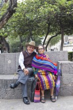 Elderly Guatemalan couple in traditional clothing, Parque Centroamérica or Parque Central,