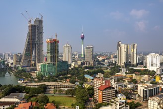 Architectural skyline with television tower and skyscrapers under a blue sky, the skyline of