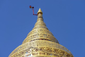 Umbrella over the Buddha statue in Wat Intharawihan, a ceremonial, often multi-level symbol of