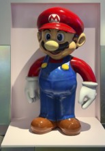 Figure of Super Mario, the icon of Nintendo game consoles, makes the leap onto mobile phones in