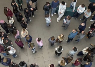 View from above of a group of people in the House of History, Bonn, North Rhine-Westphalia, Germany