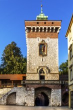 Florian's Gate with city wall and defensive towers, Krakow, Poland