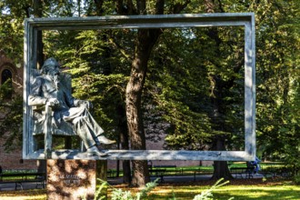 Monument to the famous Polish painter Matejko, details of the old town alleys, Krakow, Poland