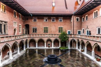 Arcade courtyard with fountain, Collegium Maius oldest building of the Jagellonian University,