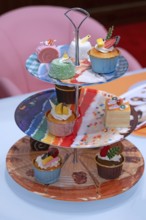 Artificial cupcakes on a cake stand, England, Great Britain