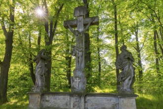 Old Way of the Cross with a group of figures of Christ on the Cross, next to Mary and John the