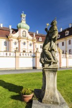 Sandstone figure of a saint, St. Marienthal Abbey on the Neisse, Ostritz, Saxony, Germany