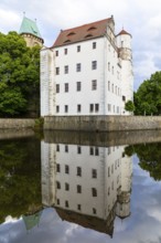 Renaissance Schönfeld Castle with reflection in water, Dresden, Saxony, Germany