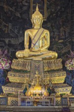 Golden Buddha statue, Bhumispara mudra, Buddha Gautama at the moment of enlightenment, Wat