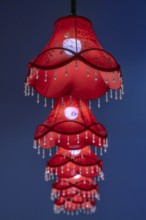 Five glowing hanging lamps, England, Great Britain