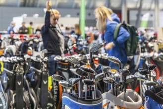 Presentation of golf clubs. Caravan — Motor — Tourism trade fair in Stuttgart. Stuttgart,