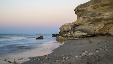 Sunrise on the coast near Mirbat, Oman