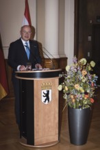 Kai Wegner, Governing Mayor of Berlin, gives a speech in front of a dinner in honor of the honorary