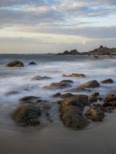 Sunrise on the beach, coast near Sadah, Oman