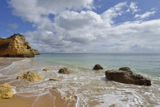 Rocky coast and beach, Praia do Pinhao, Lagos, Algarve, Portugal