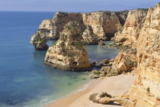 Beach and rocky coast, Praia da Marinha, Algarve, Portugal