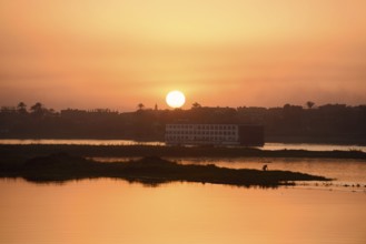 Nile cruise ship at sunset on the Nile, Luxor, Egypt