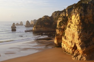 Rocky coast and beach, Praia Dona Ana, Lagos, Algarve, Portugal