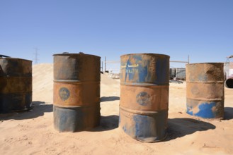Empty kerosene barrels at a gas station in the Arabian Desert, Egypt