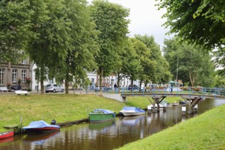Canal with boats, 'Little Amsterdam of the North' Friedrichstadt, North Frisia, Schleswig-Holstein,