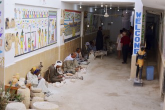 Workers and tourists in an alabaster factory, Luxor, Egypt